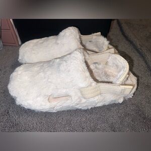 Nike women’s fur slides 8